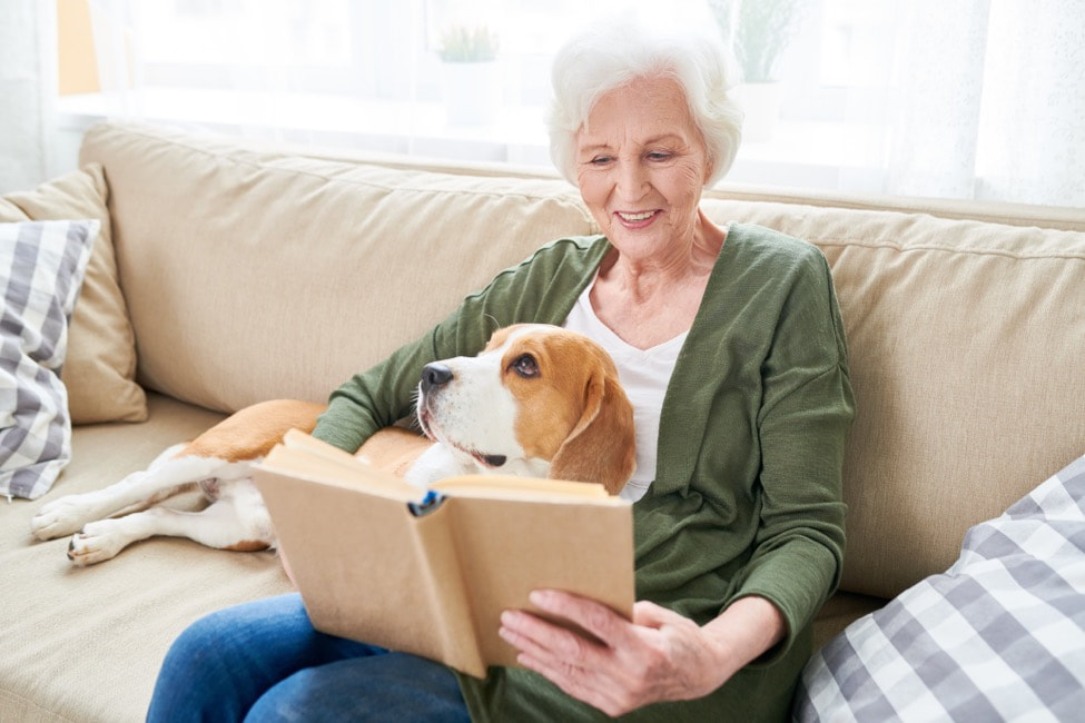 Senior Reading with Dog Picture